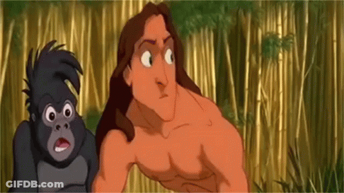 Man And Gorilla Standing Together GIF