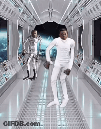 Man And Robot Dancing In Space Hallway GIF