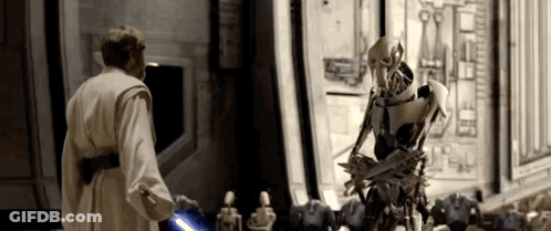 Man And Robot With Lightsaber GIF
