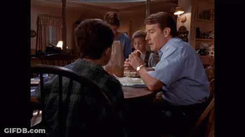 Man And Two Boys Eating Hamburgers GIF