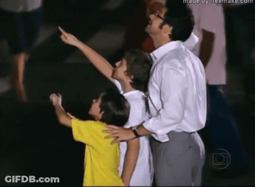 Man And Two Children Looking Up Made By Freemake.com GIF