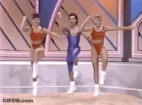Man And Two Women Aerobics Stage GIF