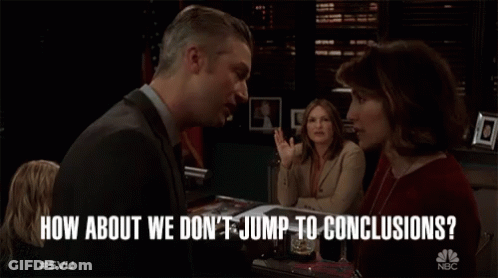 Man And Two Women At Desk Saying How About We Don't Jump To Conclusions GIF