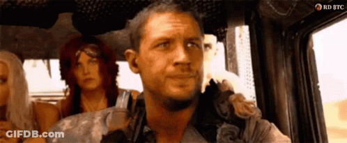 Man And Two Women In Back Of Truck GIF