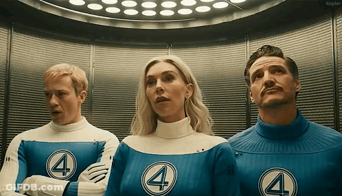 Man And Two Women In Fantastic Four Uniforms GIF