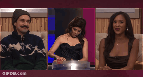 Man And Two Women On Couch Open-Mouthed GIF