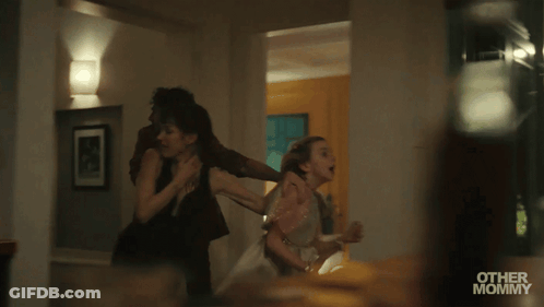 Man And Two Women Running In Front Of Mirror With Other Mommy GIF