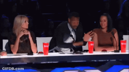Man And Two Women Sitting At Table With Soda GIF