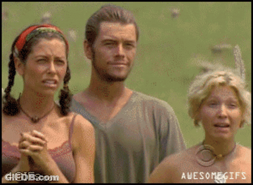 Man And Two Women Standing GIF