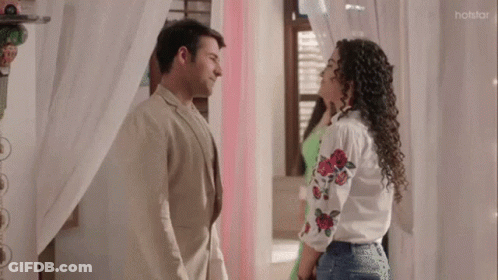 Man And Two Women Standing Next To Each Other Green Saree GIF