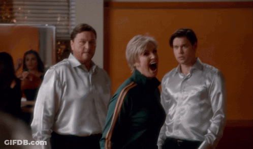 Man And Two Women Standing Together GIF