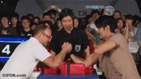 Man And Woman Arm Wrestling Crowd Number 4 GIF