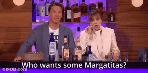 Man And Woman At Bar With Margaritas GIF