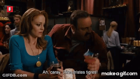 Man And Woman At Bar Woman Saying Estoy Feliz GIF