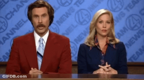 Man And Woman At Channel 4 News Desk GIF