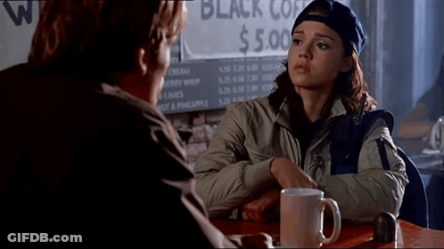 Man And Woman At Coffee Sign GIF