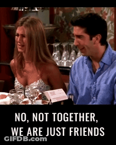 Man And Woman At Table Saying No Not Together We Are Just Friends GIF