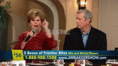 Man And Woman At Table With Jim Baker Show Ad GIF