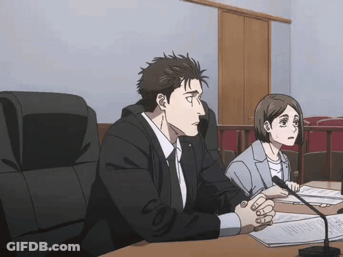 Man And Woman At Table With Papers And Microphone GIF