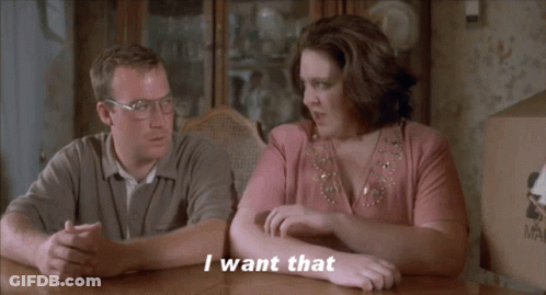 Man And Woman At Table Woman Saying I Want That GIF