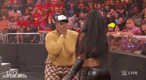 Man And Woman At Wrestling Show GIF