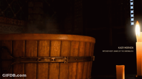 Man And Woman Bathing In Wooden Bucket GIF