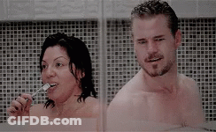 Man And Woman Brushing Teeth In Shower Together GIF