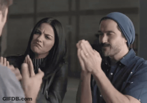 Man And Woman Clapping Hands In Room GIF