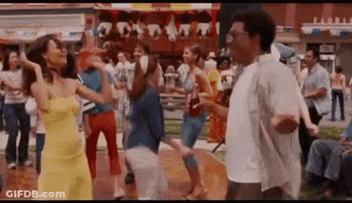 Man And Woman Dancing At Carnival GIF