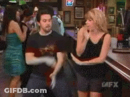 Man And Woman Dancing In Bar GIF