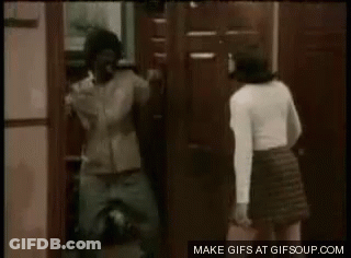 Man And Woman Dancing In Black And White Living Room GIF