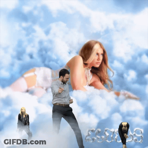 Man And Woman Dancing In Clouds GIF
