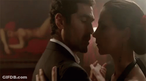 Man And Woman Dancing In Dark Room GIF