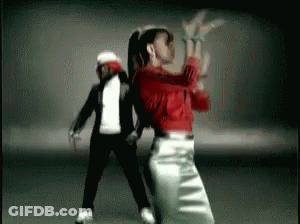 Man And Woman Dancing In Dark Room GIF