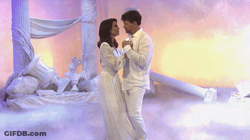 Man And Woman Dancing In Foggy Room GIF