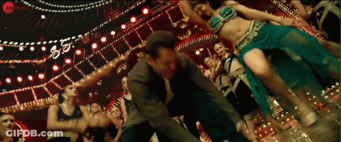 Man And Woman Dancing In Front Of 50 Sign GIF
