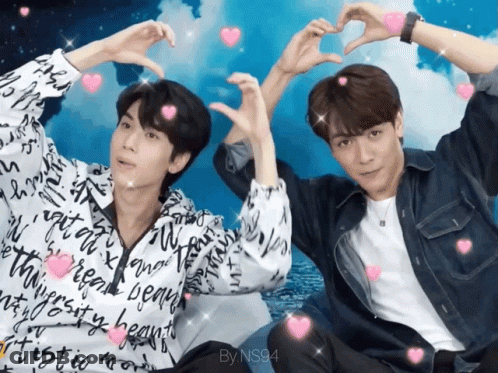 Man And Woman Dancing In Front Of 50 Sign GIF