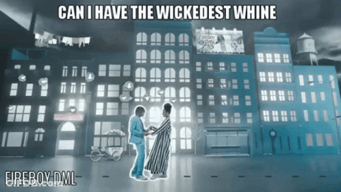 Man And Woman Dancing In Front Of City Saying Can I Have The Wickedest Whine GIF