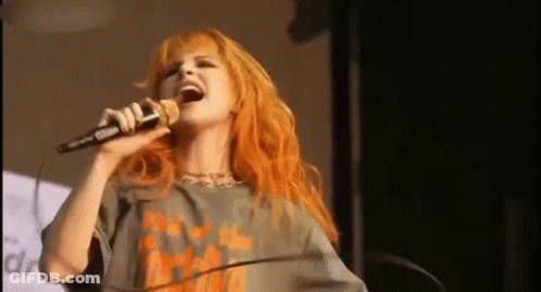 Man And Woman Dancing In Front Of Crowd GIF