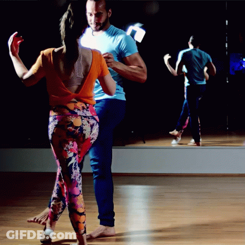 Man And Woman Dancing In Front Of Mirror GIF