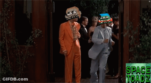 Man And Woman Dancing In Front Of Space Toadz Sign GIF