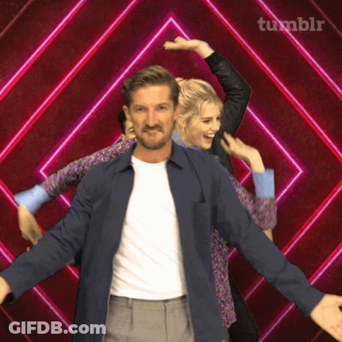 Man And Woman Dancing In Front Of Tumblr Banner GIF