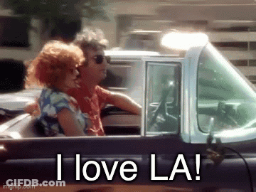 Man And Woman Dancing In Front Of TV Saying Things Are Getting Bad Again GIF
