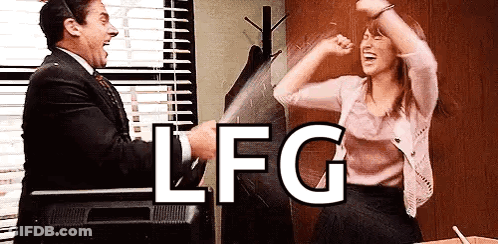 Man And Woman Dancing In Front Of TV With LFG GIF