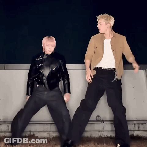 Man And Woman Dancing In Front Of Wall GIF