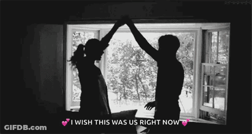 Man And Woman Dancing In Front Of Window Saying I Wish This Was Us Right Now GIF