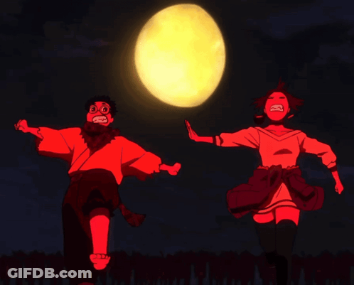 Man And Woman Dancing In Front Of Yellow Moon GIF