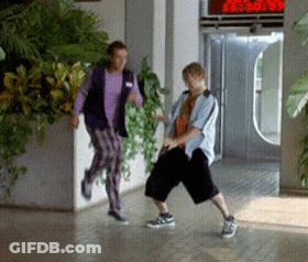 Man And Woman Dancing In Hallway GIF