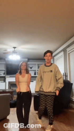Man And Woman Dancing In Living Room GIF