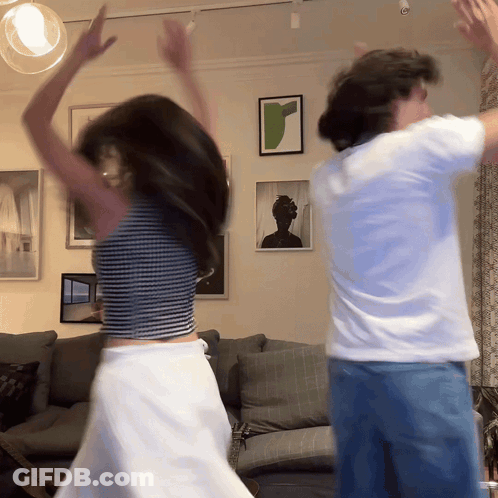 Man And Woman Dancing In Living Room GIF